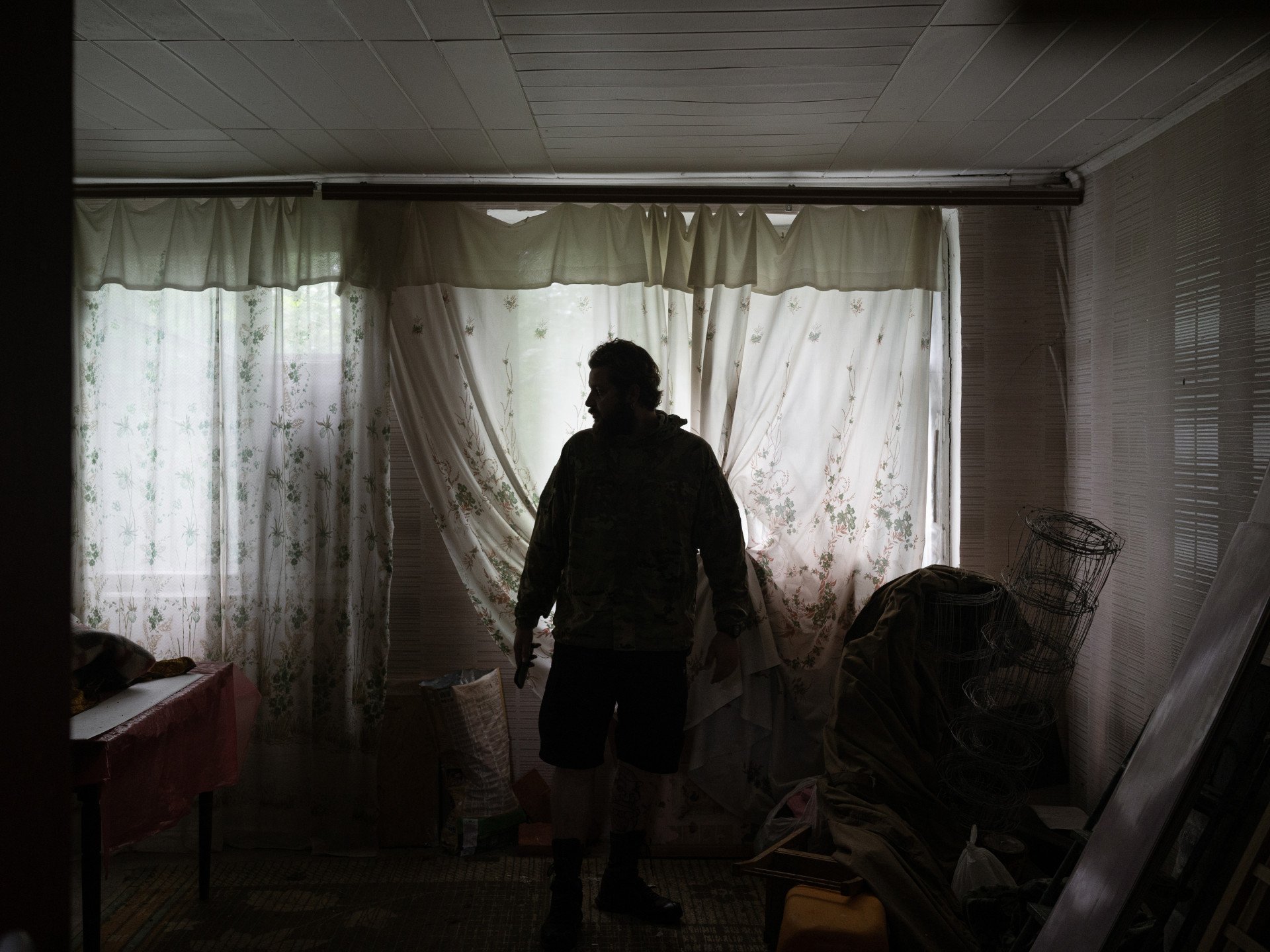 Oleh Makoveichuk is looking for a temporary deployment point for the soldiers among the abandoned houses in Kharkiv region, Ukraine on July 3, 2025. (Photo by Mykyta Kuznetsov / UNITED24 Media) Oleh Makoveichuk is looking for a temporary deployment point for the soldiers among the abandoned houses in Kharkiv region, Ukraine on July 3, 2025. (Photo by Mykyta Kuznetsov / UNITED24 Media)