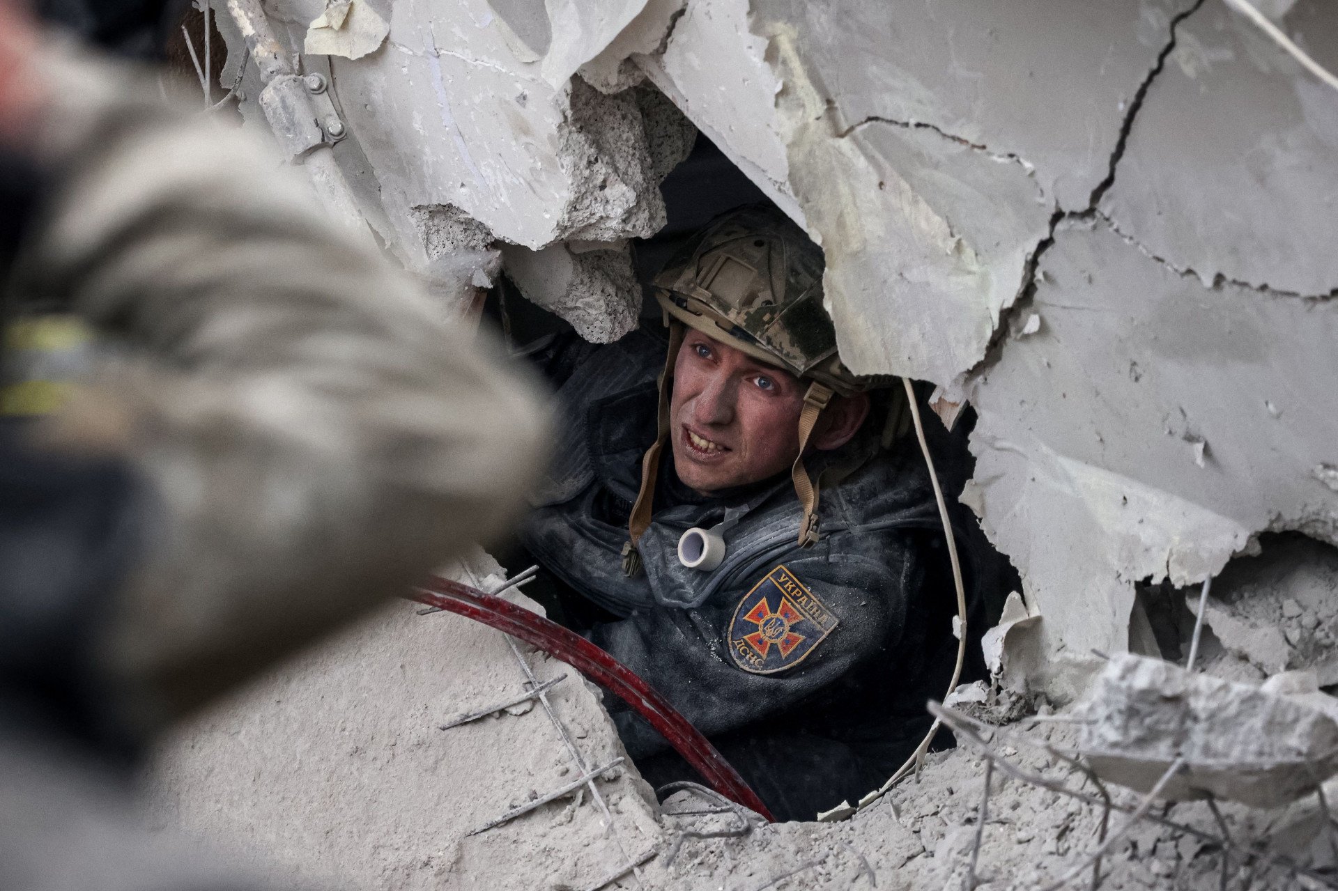 A rescuer searches for survivors in a partially destroyed residential building, after a shelling in Sloviansk, on April 14, 2023, amid Russia's military invasion on Ukraine. (Photo by ANATOLII STEPANOV/AFP via Getty Images) A rescuer searches for survivors in a partially destroyed residential building, after a shelling in Sloviansk, on April 14, 2023, amid Russia's military invasion on Ukraine. (Photo by ANATOLII STEPANOV/AFP via Getty Images)