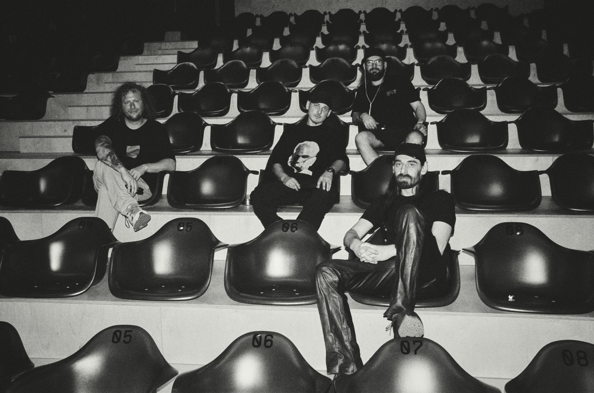 The four founders of Some People, Mykyta Demenkov, Denys Kravchenko, Slava Prokhorov, and Anton Nazarko, sit inside their newly built cinema and audiovisual room. Photo: Joshua Olley / UNITED24 Media. The four founders of Some People, Mykyta Demenkov, Denys Kravchenko, Slava Prokhorov, and Anton Nazarko, sit inside their newly built cinema and audiovisual room. Photo: Joshua Olley / UNITED24 Media.