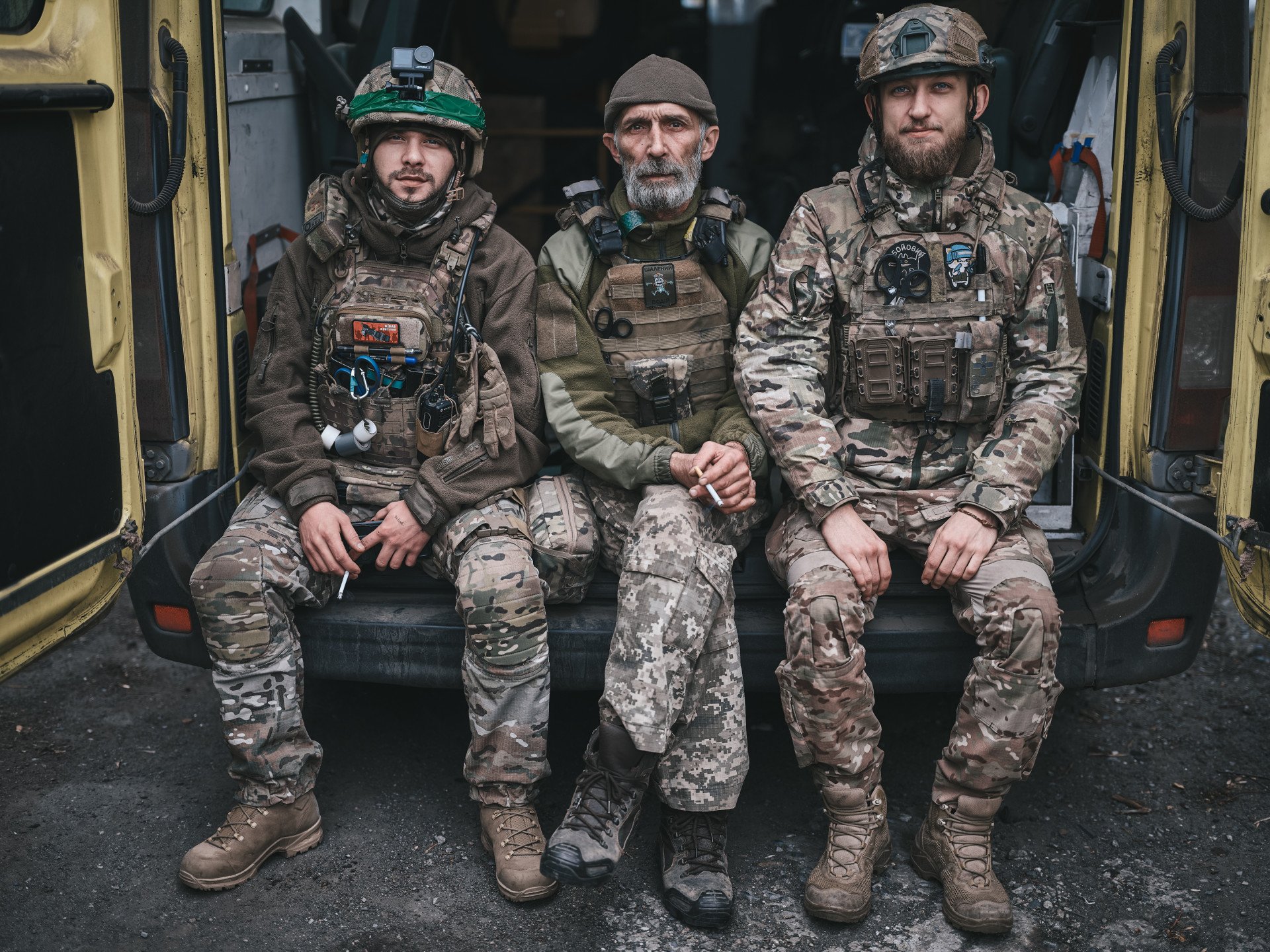 Vitsik (l) and Eugene (r) together with the driver (middle), callsign “Ded” (eng: old man, grandpa). (Photo by Libkos) Vitsik (l) and Eugene (r) together with the driver (middle), callsign “Ded” (eng: old man, grandpa). (Photo by Libkos)