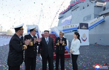 Kim Jong Un attends the launch ceremony of the destroyer Choe Hyon with navy officers. (Source: KCNA) Kim Jong Un attends the launch ceremony of the destroyer Choe Hyon with navy officers. (Source: KCNA)