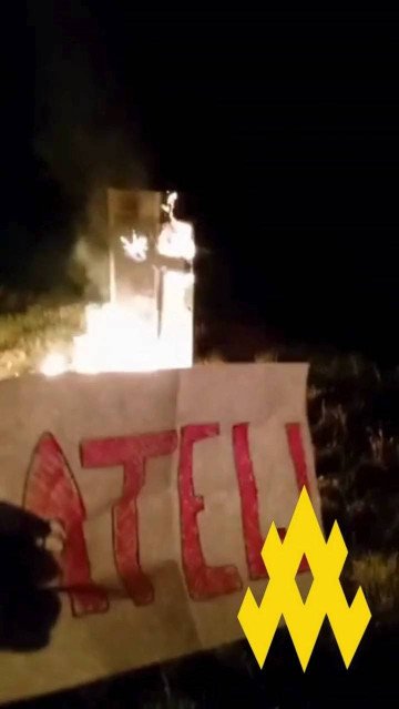 A burning railway relay cabinet following an ATESH sabotage operation in occupied Tokmak, Zaporizhzhia region. (Photo: ATESH)