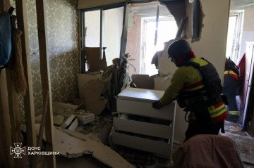 Emergency workers inspect a damaged residential building after a Russian guided bomb strike on Kharkiv. (Source: DSNS Kharkiv) Emergency workers inspect a damaged residential building after a Russian guided bomb strike on Kharkiv. (Source: DSNS Kharkiv)