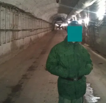 Unverified image believed to show a tunnel inside Object 1335 and a Russian serviceman. (Source: Danwatch)