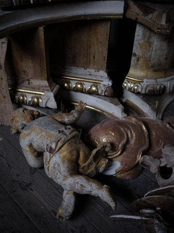 Gilded objects awaiting restoration.