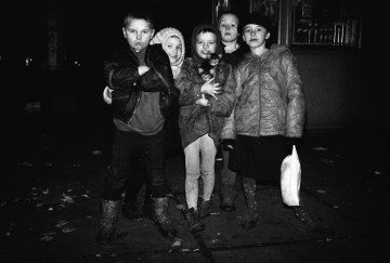 A group photo of homeless children taken after midnight, when they asked to be photographed the way they wanted. Kyiv, Pochaina, 1996. Photo: Oleksandr Glyadyelov 
