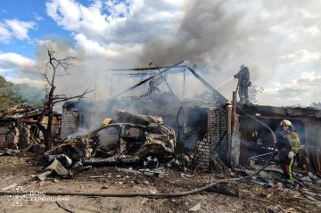 Firefighters work at the scene of a Russian guided aerial bomb strike that damaged homes and a vehicle in Izium, Kharkiv region, August 13, 2026. (Source: DSNS Kharkiv) Firefighters work at the scene of a Russian guided aerial bomb strike that damaged homes and a vehicle in Izium, Kharkiv region, August 13, 2026. (Source: DSNS Kharkiv)