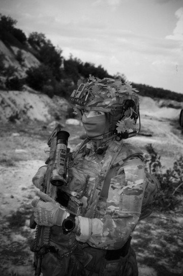Kita, 31 years old, is a combat medic in the 3rd Assault Brigade, poses for the photo in Izium, Kharkiv region, Ukraine, July 2025. (Source: Joshua Olley) Kita, 31 years old, is a combat medic in the 3rd Assault Brigade, poses for the photo in Izium, Kharkiv region, Ukraine, July 2025. (Source: Joshua Olley)