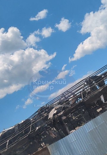 A partially destroyed military vehicle storage hangar in occupied Feodosia after a reported overnight attack. (Source: Krymskyi Veter) A partially destroyed military vehicle storage hangar in occupied Feodosia after a reported overnight attack. (Source: Krymskyi Veter)