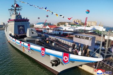 The Choe Hyon destroyer displayed with full naval honors at the ceremony. (Source: KCNA) The Choe Hyon destroyer displayed with full naval honors at the ceremony. (Source: KCNA)
