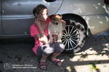 A woman holds her dog following a Russian attack on the Zaporizhzhia region. (Source: Zaporizhzhia Regional Military Administration) A woman holds her dog following a Russian attack on the Zaporizhzhia region. (Source: Zaporizhzhia Regional Military Administration)