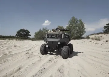 Varkhan ground robotic complex transporting cargo across rough terrain. (Source: Air3F via Oboronka) Varkhan ground robotic complex transporting cargo across rough terrain. (Source: Air3F via Oboronka)