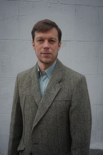 Oleg Sosnov, curator of the exhibit “And I Saw,” by Ukrainian photographer Oleksandr Glyadyelov, in collaboration with The Ukrainian House, Kyiv, Ukraine, September 2025. Photo: Josh Olley/UNITED24 Media