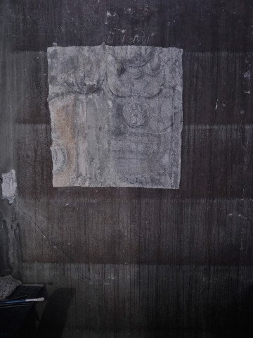 Patinaed walls reveal the outlines where the bookshelves once stood. Patinaed walls reveal the outlines where the bookshelves once stood.