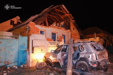A damaged house and vehicle after a Russian strike in Kharkiv, Ukraine on October 1, 2025. (Source: SES)