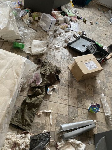 Following the 2022 Ukrainian counteroffensive that freed the Kyiv region, Bohdan, owner of the Bucha stables, photographed a Russian uniform discarded among the debris left in his stable kitchen. (Photo: Private source) Following the 2022 Ukrainian counteroffensive that freed the Kyiv region, Bohdan, owner of the Bucha stables, photographed a Russian uniform discarded among the debris left in his stable kitchen. (Photo: Private source)