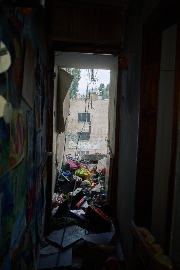 A child’s room, destroyed. Toys and drawings are all that remain intact after a Russian air weapon tore through this home. Kyiv, Ukraine. July 31, 2025. Photo by Josh Olley/UNITED24 Media
