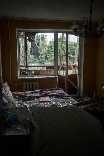 A quiet bedroom, ripped open by a Russian strike. Kyiv, Ukraine. July 31, 2025. Photo by Josh Olley/UNITED24 Media