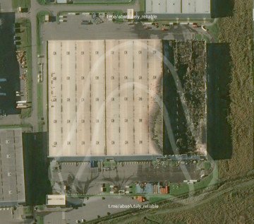 Satellite imagery shows extensive fire damage at an OZON logistics hub in St. Petersburg, where more than 10,000 square meters were reportedly affected by attack. (Source: Absolutely Reliable)