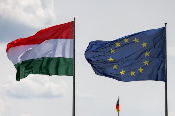 Hungary Blocks Next Procedural Step in Ukraine and Moldova EU Membership Talks The Hungarian national flag and the European Union flag. (Source: Getty Images)