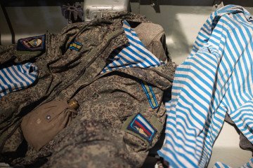 Fragments of Russian military uniform are shown in the exhibition Ukraine: Crucifixion at the National Museum of the History of Ukraine in the Second World War, on May 8, 2022 in Kyiv, Ukraine. (Source: Getty Images)