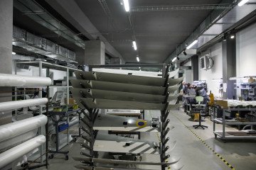 A rack of wings for the Raybird-3 reconnaissance drone systems at a manufacturing facility operated by Skyeton. (Source: Getty Images)
