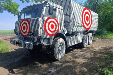 Illustrative image. Russian “camouflaged” military truck with added strike marks.