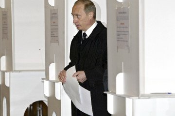 Record 7-Year Low for Putin’s Approval Rating After Telegram and VPN Blocks Russia's leader Vladimir Putin at a polling station in Moscow, 14 March 2004. (Source: Getty Images)