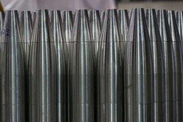 Artillery shell casings are seen lined up during the manufacturing process at a defense production facility. Illustrative photo. (Source: Bel Novosti)