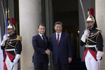 China Commits to Withholding Weapon Sales to Russia, Macron Announces