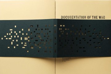 The physical edition of Documentation of the War by Kharkiv-based photographer Vladyslav Krasnoshchok. (Source: Ukrainian Association of Professional Photographers)