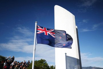 The New Zealand flag flies during the Ataturk Memorial Service at Ataturk Memorial on April 25, 2018 in Wellington, New Zealand. (Source: Getty Images)