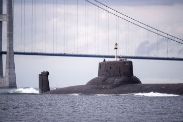 Illustrative image. The Russian nuclear submarine Dmitrij Donskoj sails under the Great Belt Bridge between Jutland and Funen through Danish waters, near Korsør, on July 21, 2017. (Source: Getty Images)