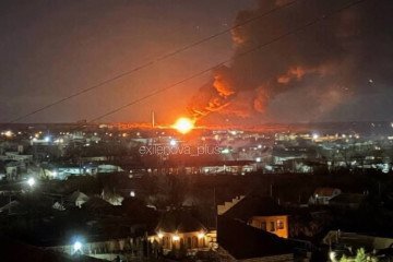 A massive fire illuminates the night sky over occupied Luhansk early on February 27 after Ukrainian drones struck a key Russian military fuel depot. (Source: Exilenova+)