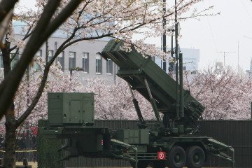 Japanese Air Self-Defense Forces' Patriot Advanced Capability-3 (PAC-3) interceptor missile launcher is put back in its place at the defense ministry in Tokyo on April 5, 2009.