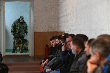Russian Companies Prepare Management and HR Staff for Potential Employee Mobilization People arrive at recruiting office to register themselves after declaration of mobilization on February 23, 2022. (Source: Getty Images)