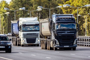 Heavy dump trucks DAF and Volvo are traveling along the intercity highway in Russia. (Source: Getty Images) Heavy dump trucks DAF and Volvo are traveling along the intercity highway in Russia. (Source: Getty Images)