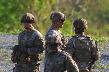 United States Army and Philippine Army troops stand guard near a HIMARS missile system, during a live-fire drill as part of the SALAKNIB multinational exercise on April 16, 2026. Illustrative photo. (Source: Getty Images)