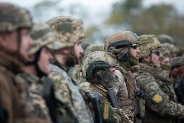 Soldiers of the 423rd Separate Battalion of Unmanned Systems “Scythian Griffins” stand in formation on October 10, 2025 in Zaporizhzhia Oblast, Ukraine. (Source: Getty Images)