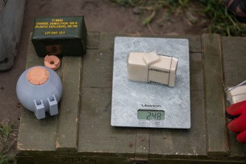 Ukrainian serviceman cuts and weighs parts of C4 plastic explosive for a 3D printed plastic hand grenade lying nearby on June 8, 2024 in Donetsk Region, Ukraine. (Source: Getty Images) Ukrainian serviceman cuts and weighs parts of C4 plastic explosive for a 3D printed plastic hand grenade lying nearby on June 8, 2024 in Donetsk Region, Ukraine. (Source: Getty Images)