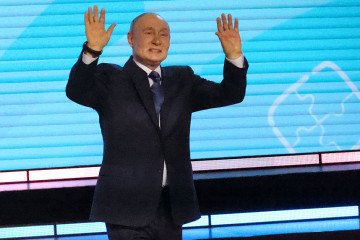 Russian leader Vladimir Putin gestures as he speaks during his meeting with children, on August 3, 2026 in Krasnoyarsk, Russia. (Source: Getty Images)