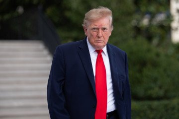 US President Donald Trump walks on the South Lawn as he departs the White House on October 12, 2026 in Washington, DC. (Source: Getty Images) US President Donald Trump walks on the South Lawn as he departs the White House on October 12, 2026 in Washington, DC. (Source: Getty Images)