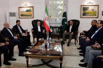 Pakistan’s Army Chief and Field Marshal Syed Asim Munir (3rd R) meeting with Iran’s Foreign Minister Abbas Araghchi (3rd L) upon his arrival in Islamabad. (Source: Getty Images)