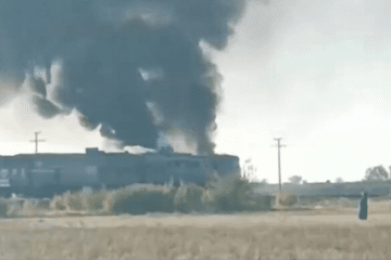 Smoke rises from a passenger train following a Russian drone strike in Ukraine. (Source: Kyiv INFO/Telegram)
