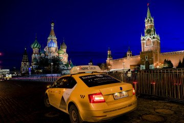 Yandex Taxi car is seen in front of Saint Basil’s Cathedral at Red Square in Moscow, Russia, on March 24, 2020.