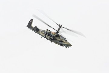 A Russian Ka-52 attack helicopter performs during an international air show on June 18, 2013. (Source: Getty Images) A Russian Ka-52 attack helicopter performs during an international air show on June 18, 2013. (Source: Getty Images)