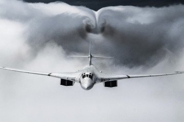 A Russian Tu-160 strategic bomber flies over Moscow during the Victory Day parade, June 24, 2020. (Source: Getty Images)