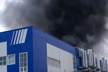 Thick black smoke rises from the Proton-PM rocket engine plant near Perm, Russia, following a fire at the facility. (Source: Exilenova+)