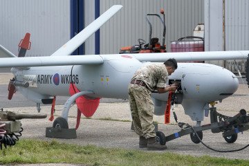 A British Army Watchkeeper drone on the apron at Lydd Airport following a surveillance flight over the English Channel, used to support maritime border monitoring operations. (Photo: Getty Images)