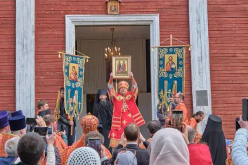 Metropolitan Mitrofan of Murmansk holds an icon of Saints Boris and Gleb during a service near Russia’s border with Norway. (Source: Diocese of Murmansk)